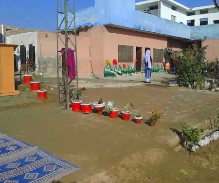 The Village Model School and College